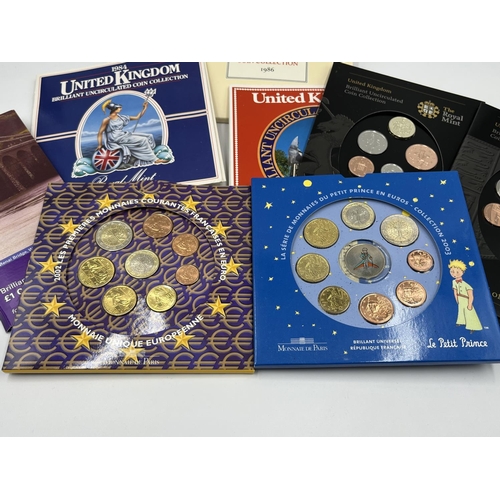 1245 - Twelve various uncirculated coins and coin sets to include 2005 the Menai Bridge, Wales £1 coin, 200... 