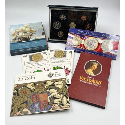 1247 - Seven various commemorative coins and coin sets to include 2005 200th anniversary Nelson Trafalgar b... 