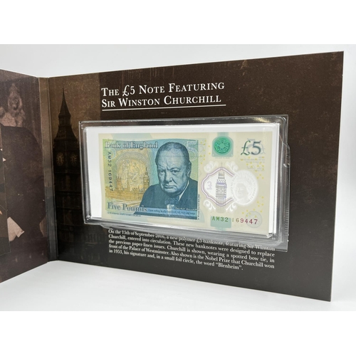 1253 - A boxed The Sir Winston Churchill banknote, stamp and coin set