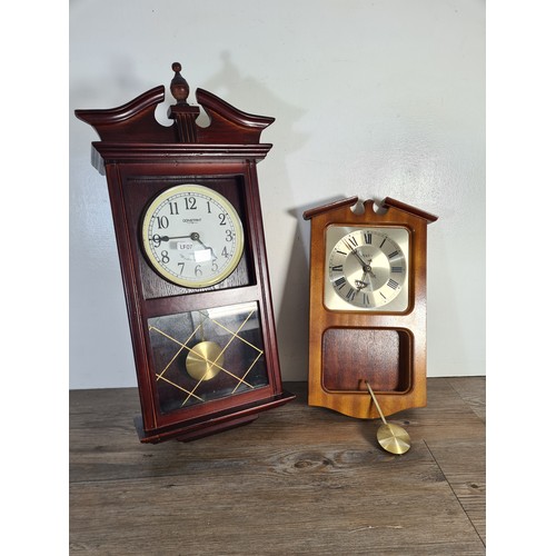 322A - Two quartz wall clocks, one Constant Westminster chime with pendulum - approx. 50cm high and one Spi... 