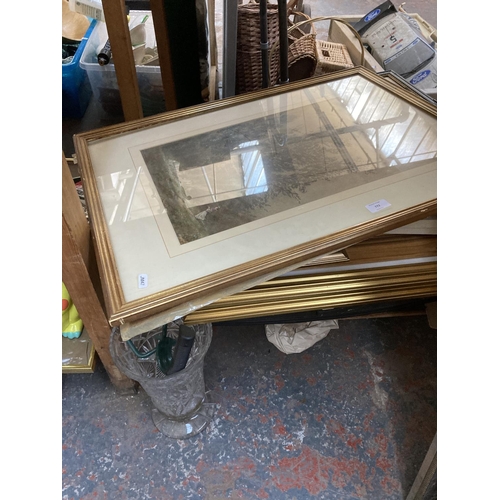 772 - A large collection of house clearance items to include two framed beveled edge wall mirrors, two ant... 