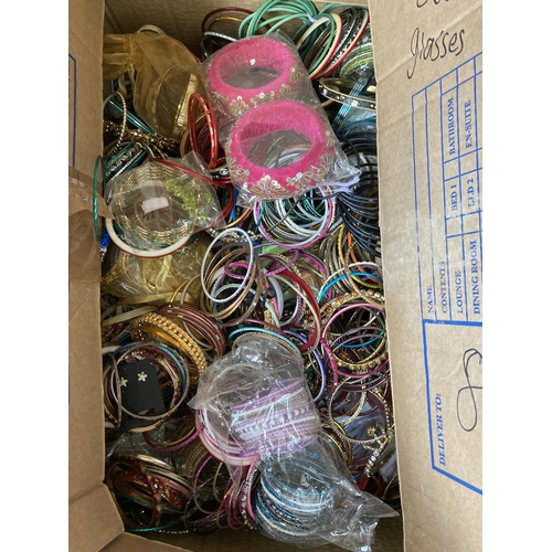 785 - Three boxes containing a large quantity of stacker bangles