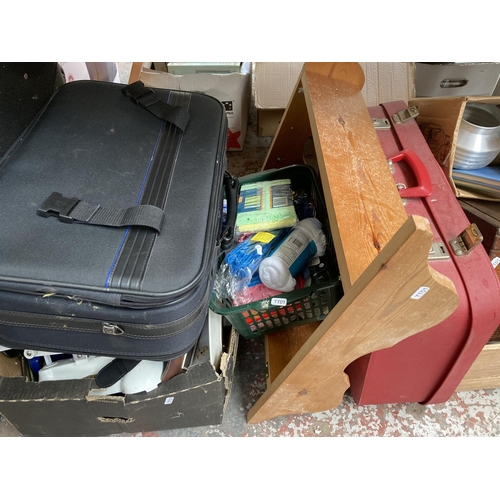 791 - Two boxes and seven suitcases containing assorted house clearance items to include Weylux weighing s... 