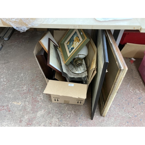 807 - A box containing assorted items to include framed prints, oil on canvas, Duplex brass oil lamp, fram... 