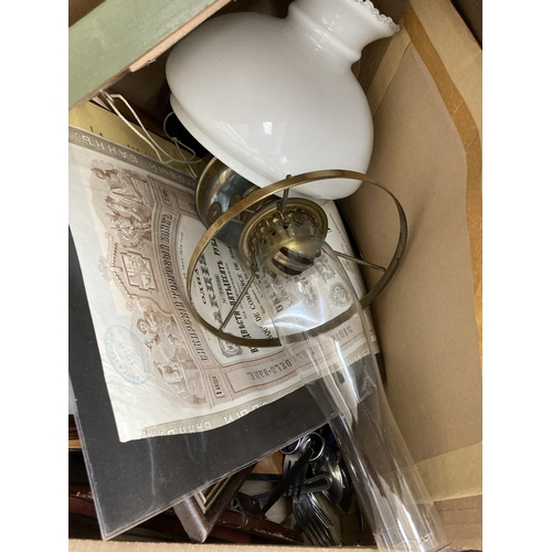 807 - A box containing assorted items to include framed prints, oil on canvas, Duplex brass oil lamp, fram... 