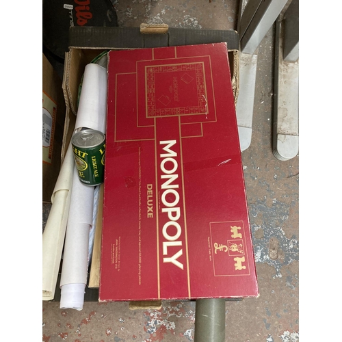 815 - Three boxes containing assorted items to include Monopoly Deluxe board game, 1970s studio pottery bo... 