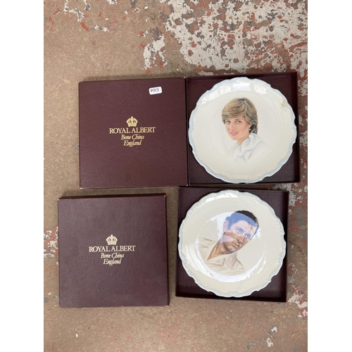 818 - Four boxes containing assorted items to include Wedgwood blue Jasperware plate, Citron quartz women'... 