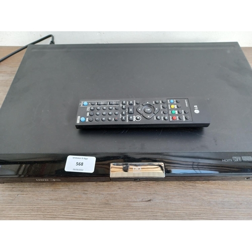 568 - An LG RHT399H HDD and DVD recorder with remote control