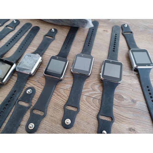 590 - A bag containing a large quantity of unbranded smart watches