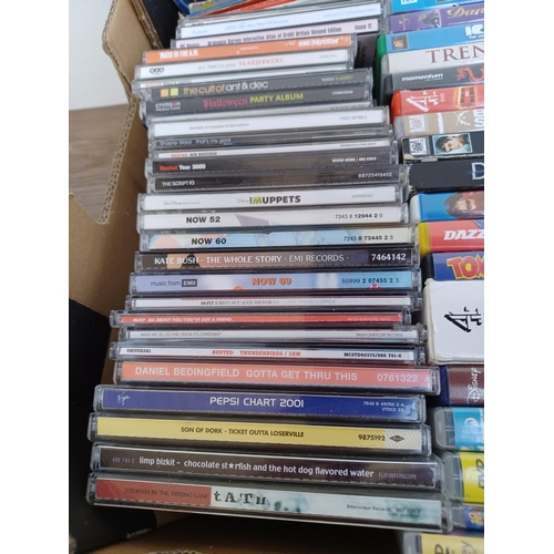 594 - A box containing a collection of DVDs and CDs - see images for titles