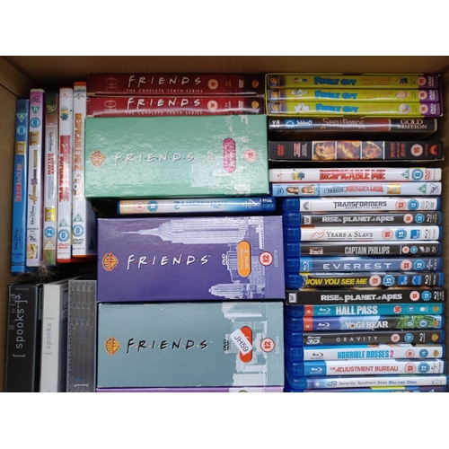 599 - A box containing a collection of Blu-rays and DVDs - see images for titles