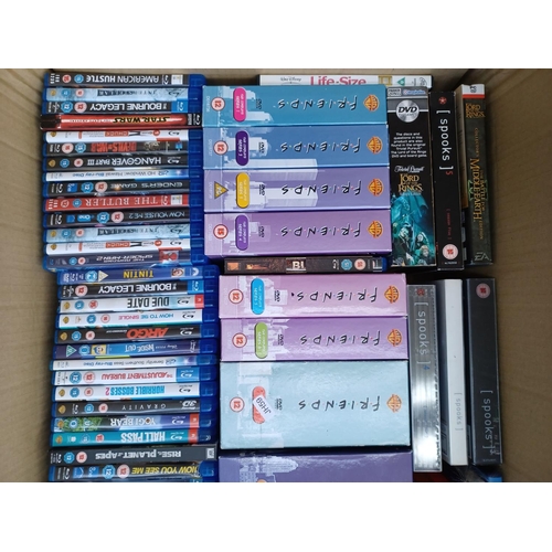 599 - A box containing a collection of Blu-rays and DVDs - see images for titles