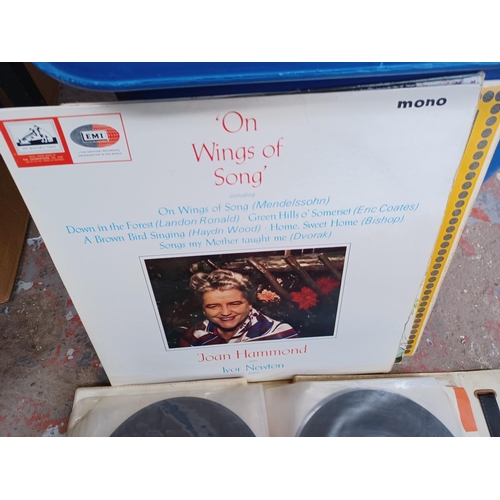 601 - Two boxes containing a large collection of vinyl records - see images for titles