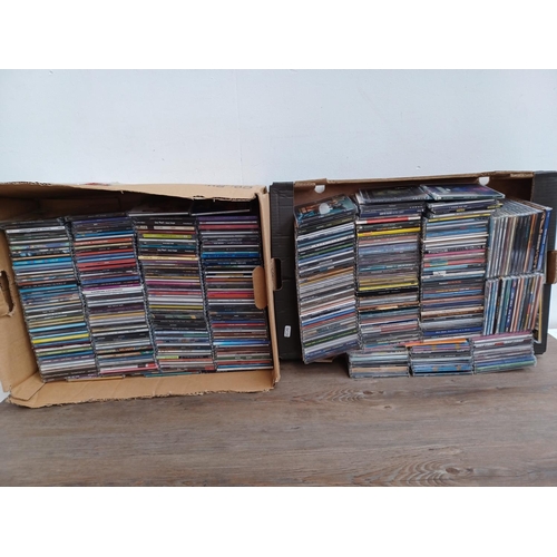 611 - Two boxes containing a large collection of CD singles to include Levellers, Longpigs, Sting, Supergr... 