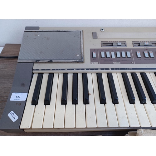 620 - Two items, one collection of vintage and antique sheet music and one early 1980s Casio Casiotone 610... 