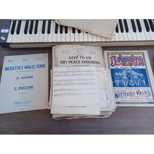 620 - Two items, one collection of vintage and antique sheet music and one early 1980s Casio Casiotone 610... 