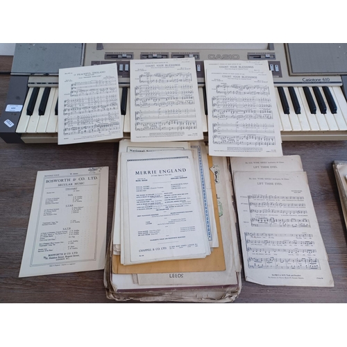 620 - Two items, one collection of vintage and antique sheet music and one early 1980s Casio Casiotone 610... 