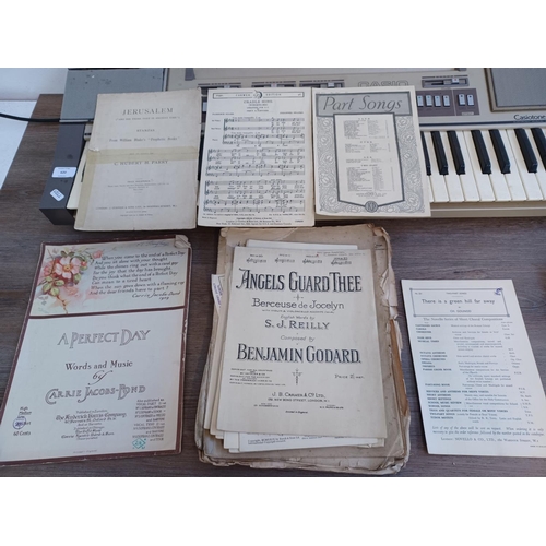 620 - Two items, one collection of vintage and antique sheet music and one early 1980s Casio Casiotone 610... 