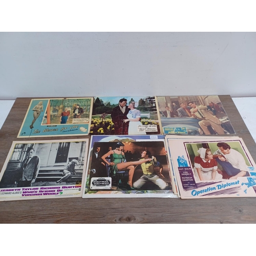 632 - A collection of lobby cards to include The Black Tent, Above Us The Waves, The Beachcomber, The Wild... 