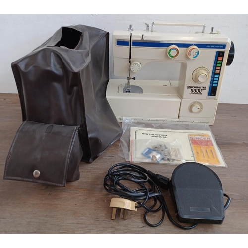 641 - A Stitchmaster Free Arm model 885 electric sewing machine with foot pedal, power cable, instruction ... 