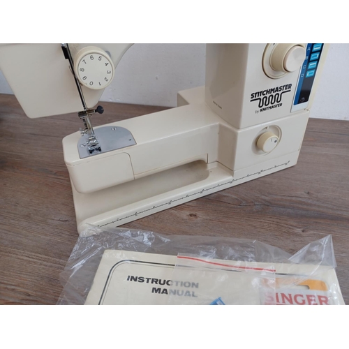 641 - A Stitchmaster Free Arm model 885 electric sewing machine with foot pedal, power cable, instruction ... 