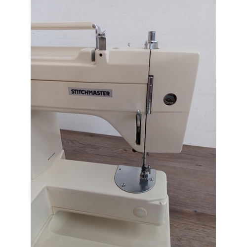 641 - A Stitchmaster Free Arm model 885 electric sewing machine with foot pedal, power cable, instruction ... 