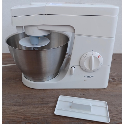 647 - A Kenwood KM300 Chef food mixer with bowl and one fitted attachment