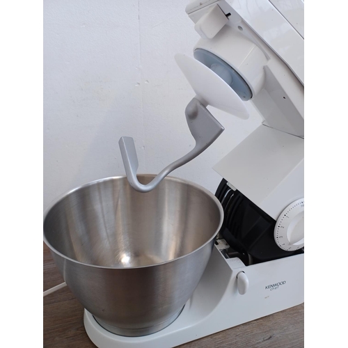 647 - A Kenwood KM300 Chef food mixer with bowl and one fitted attachment