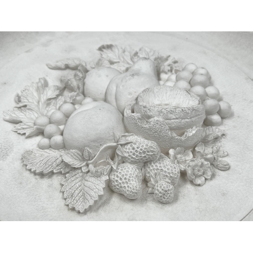 101 - A Bossons Fruit unpainted first edition circular chalkware wall plaque with certificate of authentic... 