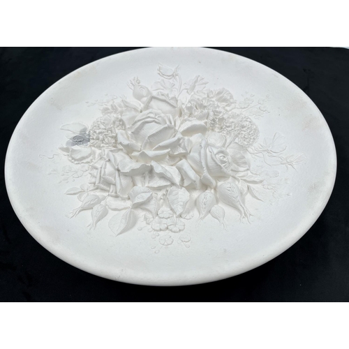 104 - A Bossons Roses and Carnations unpainted circular chalkware wall plaque - approx. 36.5cm diameter