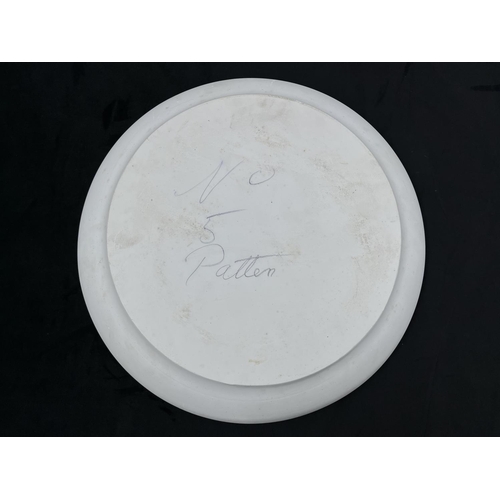 104 - A Bossons Roses and Carnations unpainted circular chalkware wall plaque - approx. 36.5cm diameter