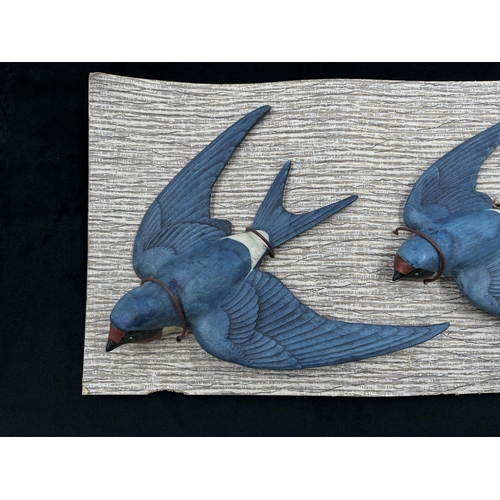 112 - A set of three Bossons pottery Swallows on original cardboard display panel - approx. 18cm high x 42... 