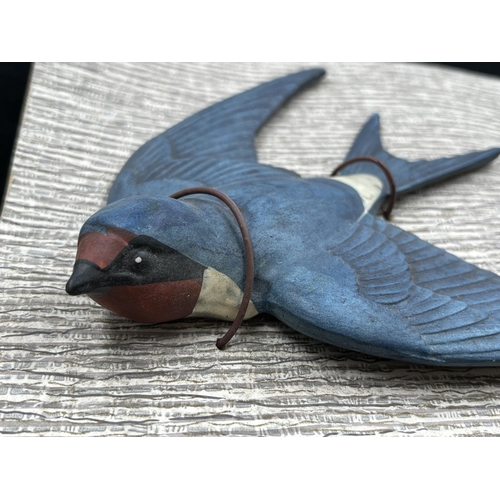 112 - A set of three Bossons pottery Swallows on original cardboard display panel - approx. 18cm high x 42... 