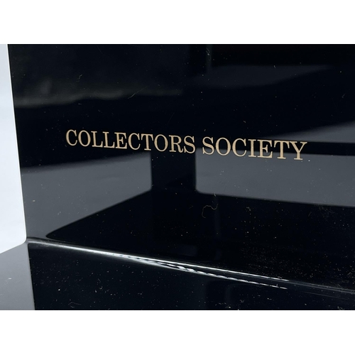 115 - An International Bossons Collectors Society plastic display stand - approx. 24cm high x 15cm wide x ... 