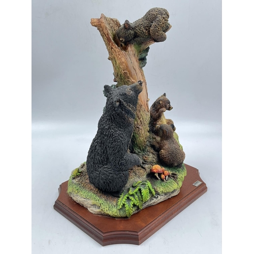 120 - A Bossons Fraser Art limited edition Crown Collection series Bears and Bees PVC figurine on mahogany... 