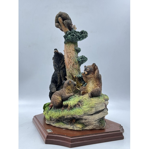 120 - A Bossons Fraser Art limited edition Crown Collection series Bears and Bees PVC figurine on mahogany... 