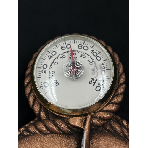 124 - A Bossons Sea Spray chalkware wall thermometer - approx. 17cm high x 12cm wide