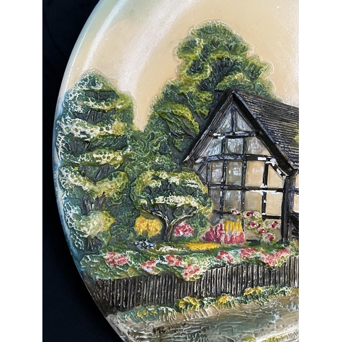 136 - An early Bossons Shakespeare's Birthplace, Stratford-upon-Avon chalkware circular wall plaque - appr... 