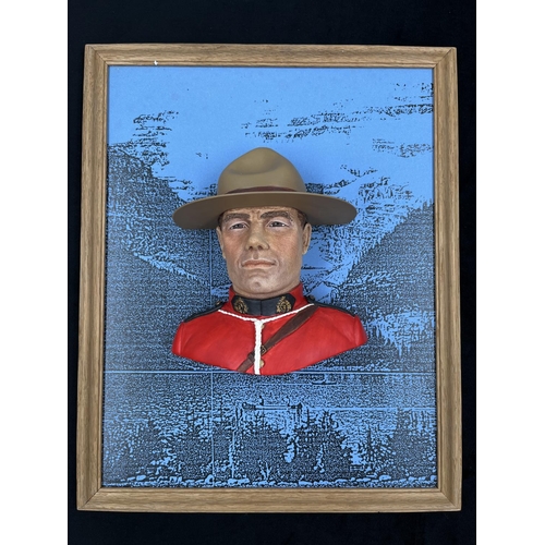 19 - A Bossons Royal Canadian Mountain Policeman chalkware head wall mask with original display panel