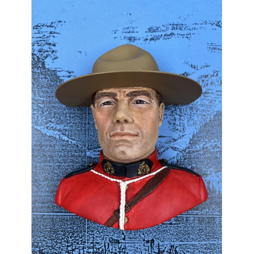 19 - A Bossons Royal Canadian Mountain Policeman chalkware head wall mask with original display panel