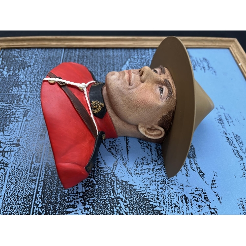 19 - A Bossons Royal Canadian Mountain Policeman chalkware head wall mask with original display panel