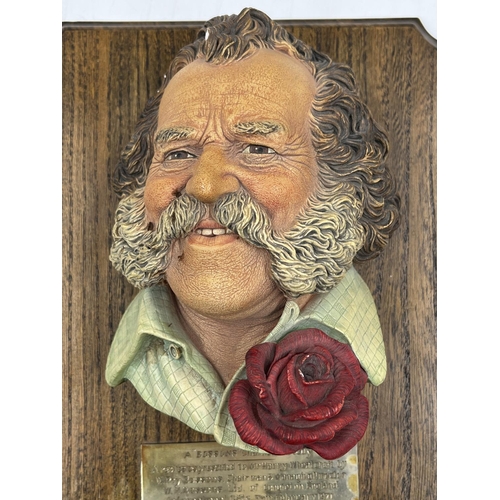 2 - A Bossons Harry Wheatcroft sample chalkware head wall mask on oak plinth with engraving 'A replica a... 