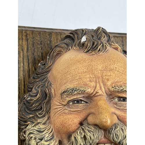 2 - A Bossons Harry Wheatcroft sample chalkware head wall mask on oak plinth with engraving 'A replica a... 