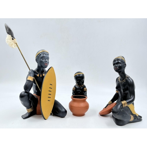 23 - A Bossons African group three piece ceramic figurine set comprising Father, Mother and Boy - father ... 