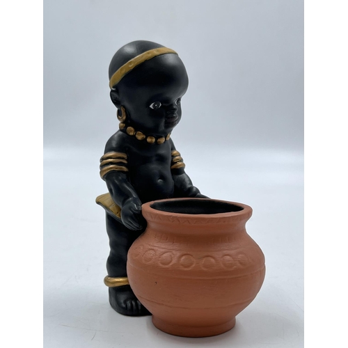 23 - A Bossons African group three piece ceramic figurine set comprising Father, Mother and Boy - father ... 