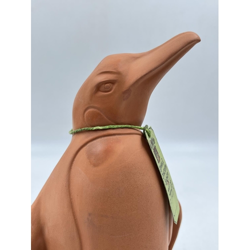 47 - A Bossons De Milo Garden and Conservatory terracotta penguin figurine - approx. 25cm high