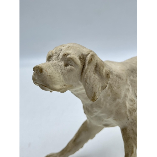 56 - A Bossons Irish Setter unpainted pottery dog figurine with certificate of authenticity - approx. 16.... 