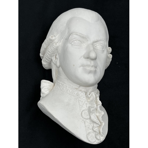 57 - Three items comprising two Mozart chalkware head wall masks; one being unpainted and one original di... 