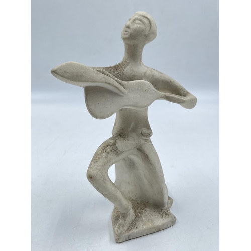 61 - A Bossons Mandolin Player unpainted pottery figurine from the Jazz Collection with certificate of au... 