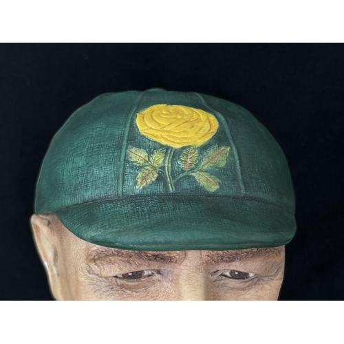 73 - A 1995 Bossons Cricketer dark green cap with yellow rose version chalkware head wall mask - approx. ... 